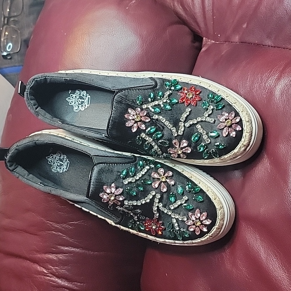 Bejeweled black loafer.  9.5